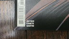 The corner is not as bad as it looks, This is very zoomed in* it is typical Trim Burr you see on a lot of comics on the spine side corners